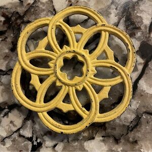 Trivet Antique Cast Iron Flower with Interlocking Circles Chippy Yellow Paint